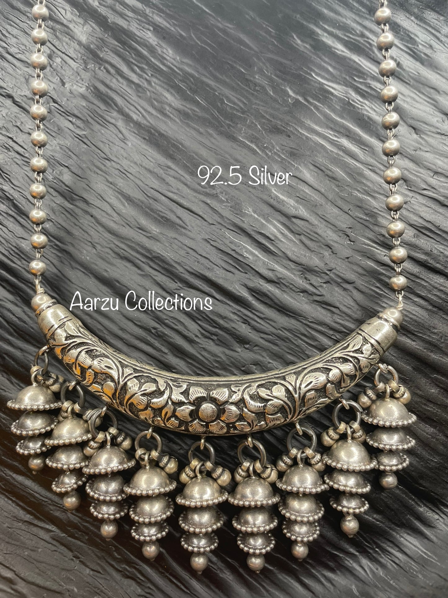 92.5 Silver mala and Hasli pendant with Jhumkies hanging- 138 gms